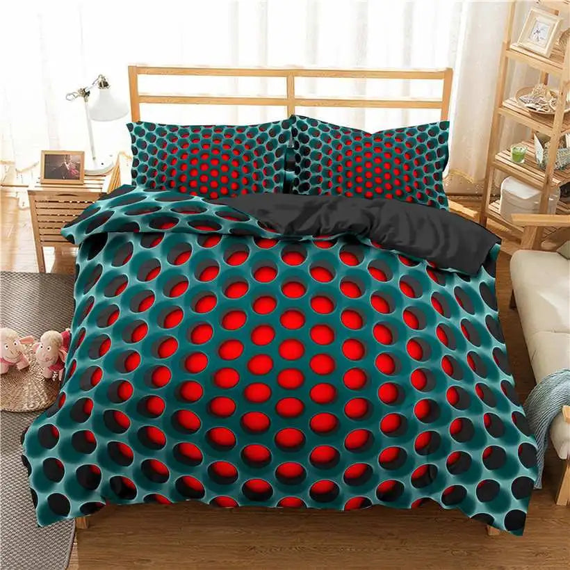 Teal and red polka dot bedding set on a bed in a bedroom.