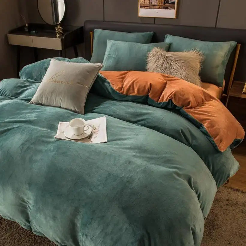 Bed with teal and orange bedding in a bedroom setting