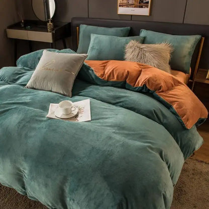 Bed with teal and orange bedding in a bedroom setting