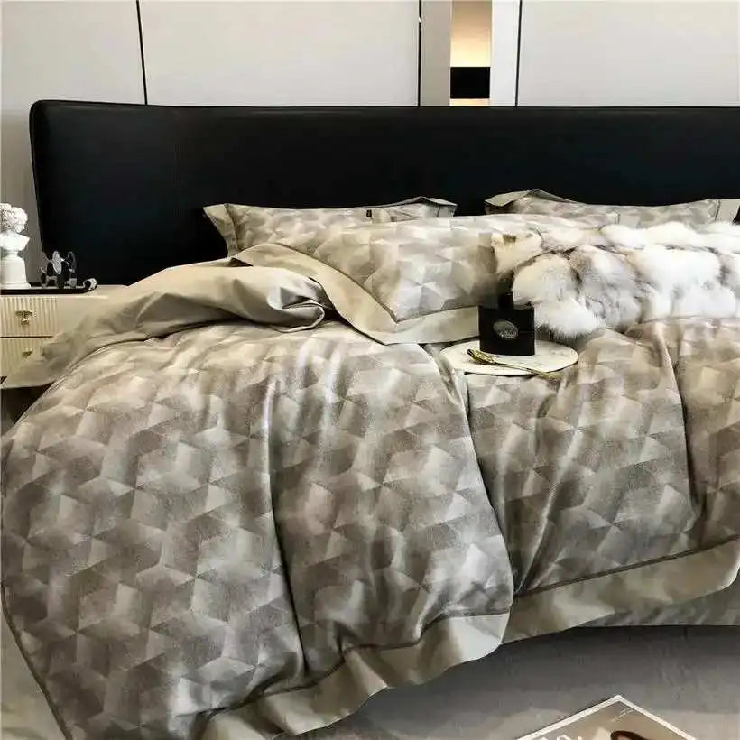 Bed with patterned bedding and pillows in a bedroom setting
