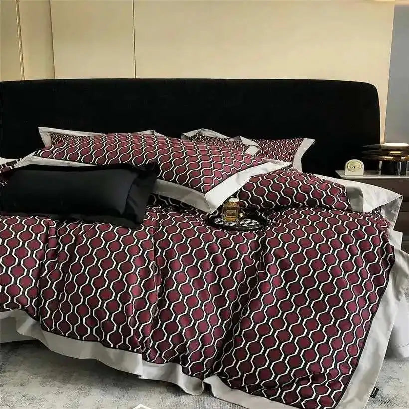 Bed with geometric patterned bedding in a modern bedroom setting.