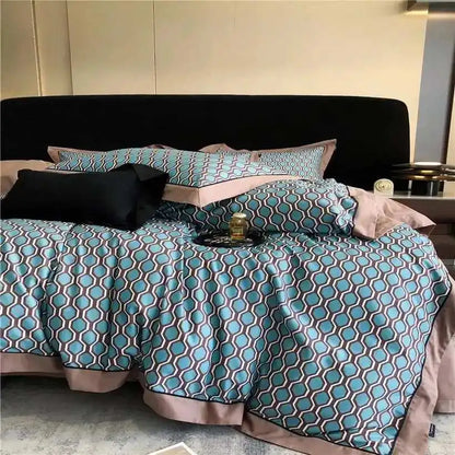Decorative bedspread with paisley pattern on a bed in a bedroom setting.