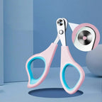 Pet nail clippers with pink and blue handles on a light blue background @chichicmart